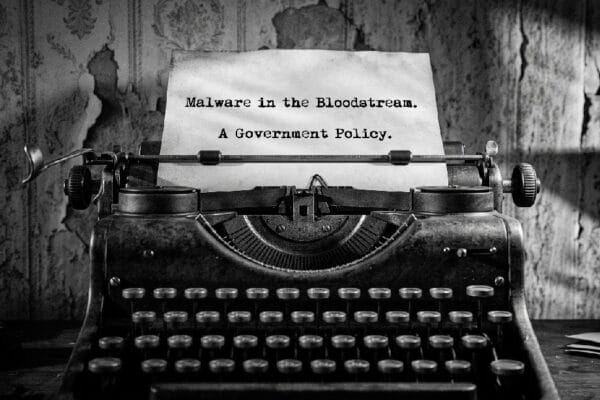 Black and white old typewriter with copy that reads Malware in the Bloodstream.